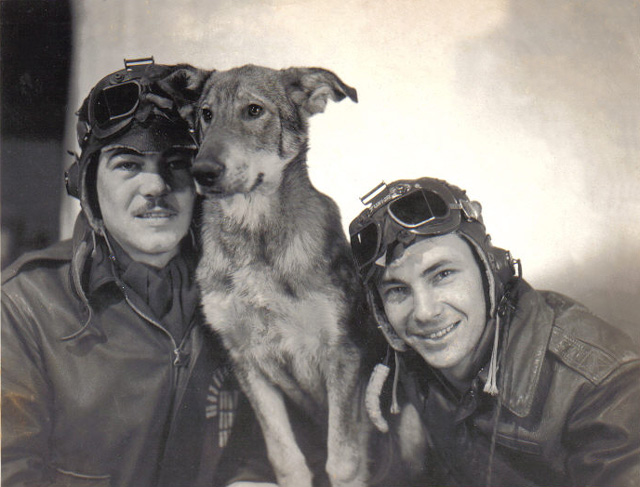 Two 553rd Bomb Squad 386th Bomb Group guys with their dog