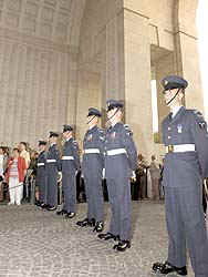Personnel from the Queens Colour Squadron Royal Air Force Regiment participate in the daily Sounding of the Last Post ceremony at the Menin Gate Memorial in Ieper