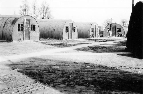These Quonset huts, not fully completed on arrival, were typical of living areas at Chipping Ongar. Larger Quonset huts were used for other purposes. 