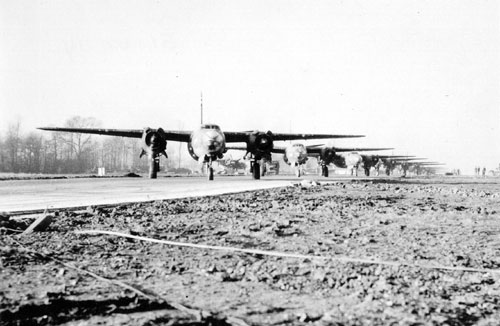 This is a photo of aircraft on the taxi way prior to take-off (note the condition of the areas around the taxiway and runway). This procedure was normal for every mission, every aircraft and crew were lined up in a specific position that they would occupy in the overall formation. 